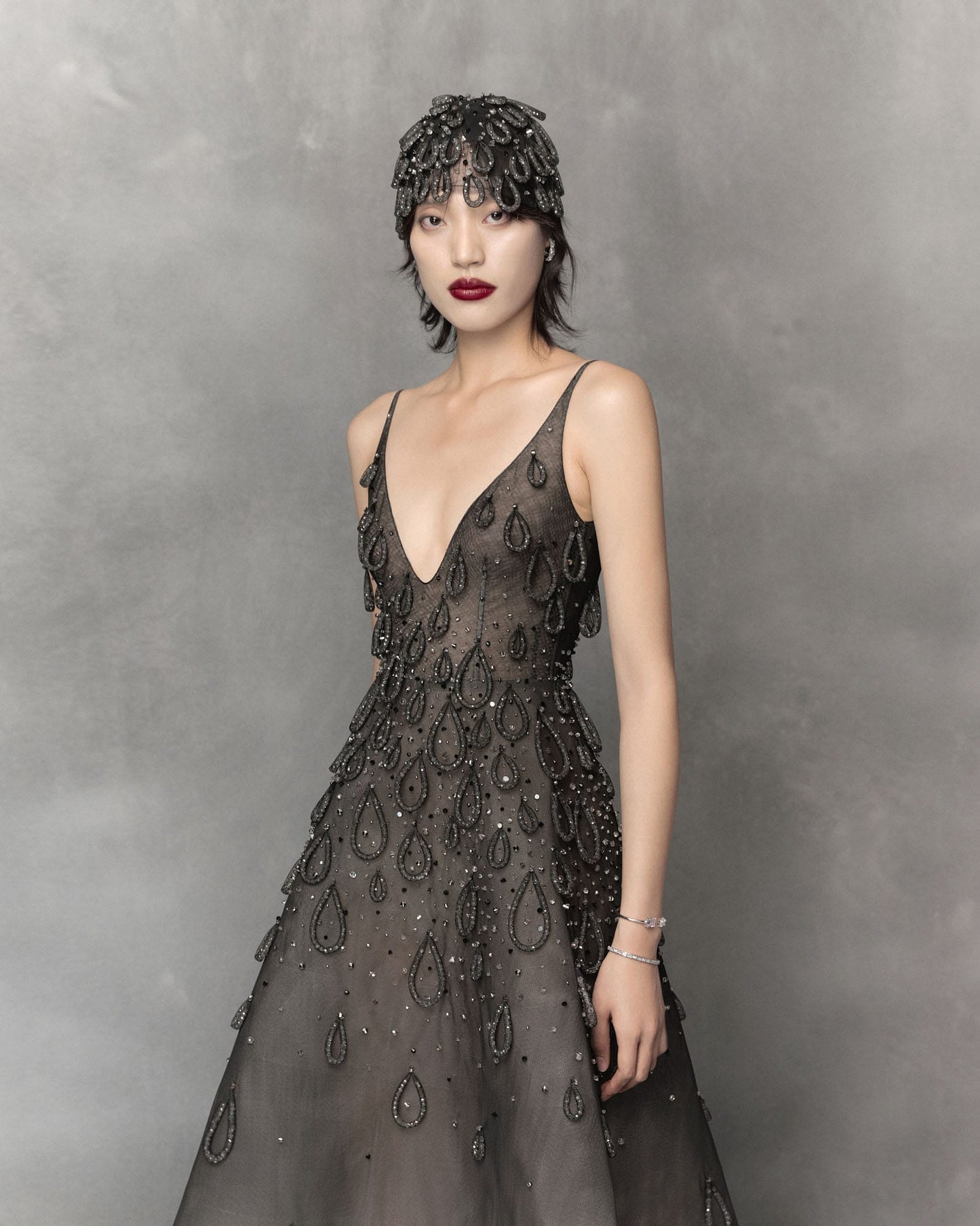 Black midi dress with attached water drop