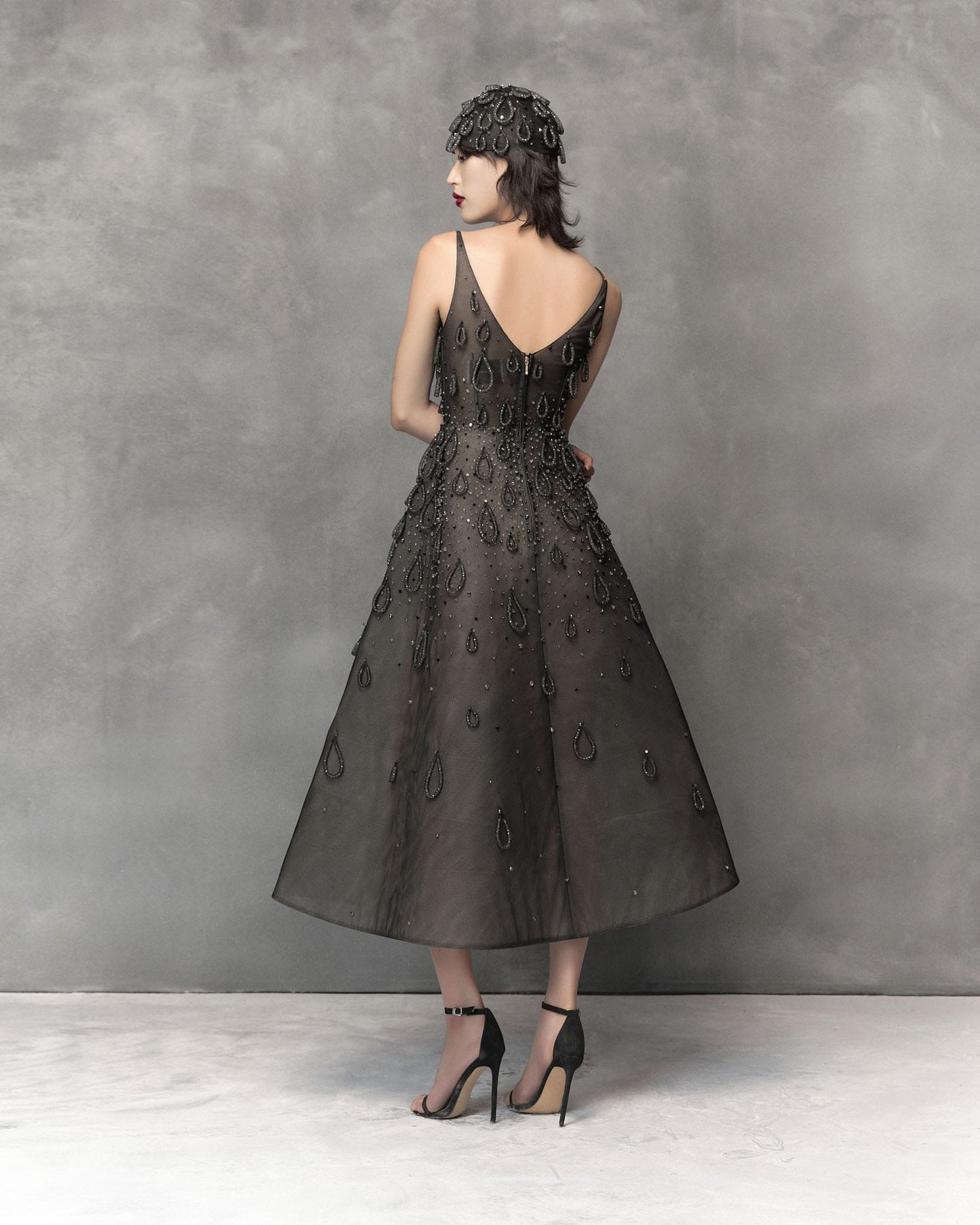 Black midi dress with attached water drop
