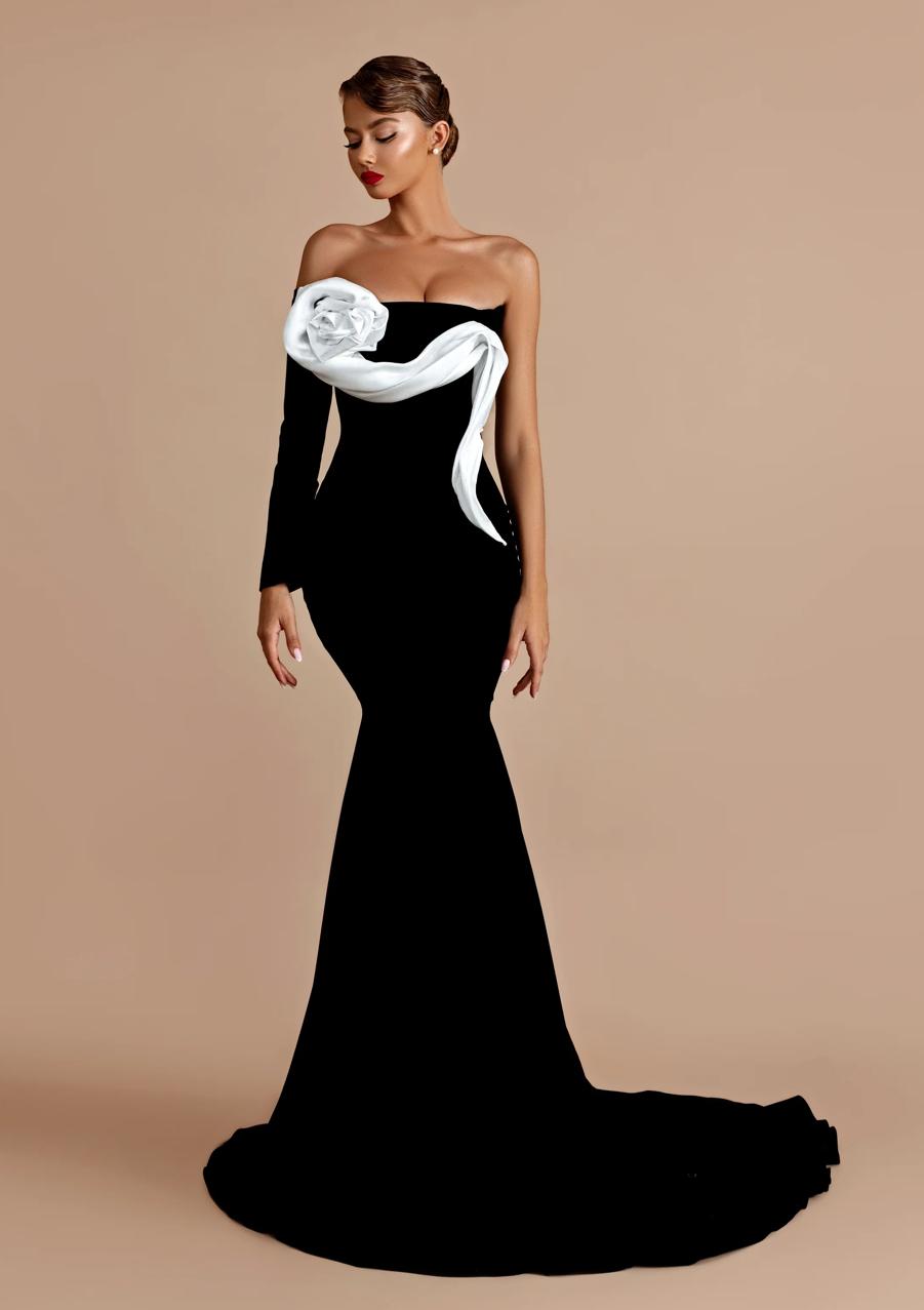 One sleeve black gown with white oral detail